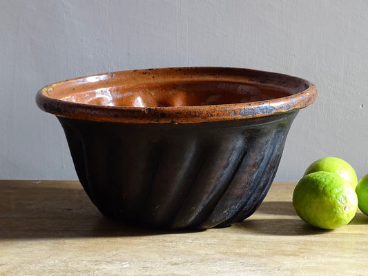 French antique Kougelhopf Mould from Alsace with deep orange glaze