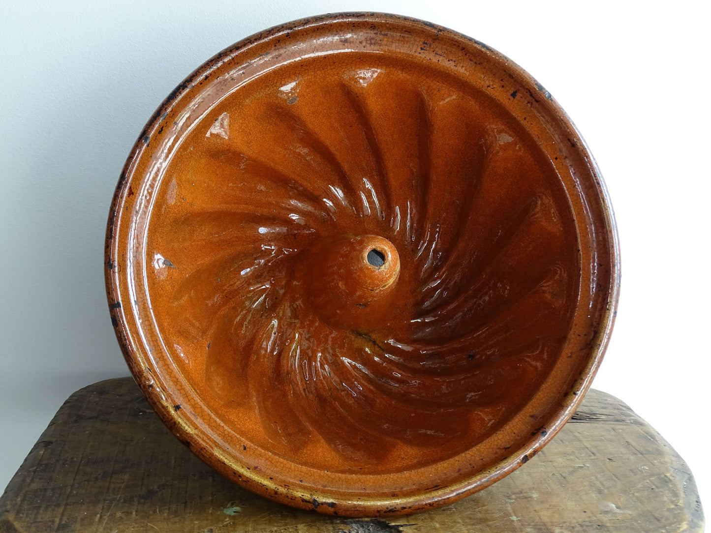 French antique Kougelhopf Mould from Alsace with deep orange glaze