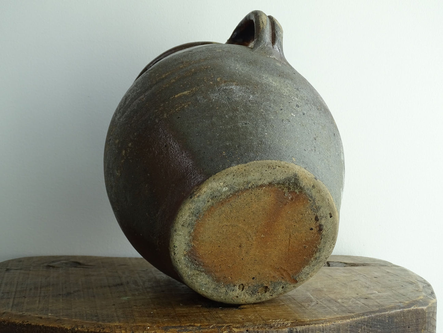 French antique earthenware vessel or confit pot in shades of brown with two handles