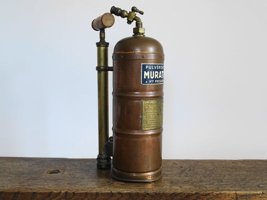 French antique copper plant sprayer or Pulvérisateur. Copper garden sprayer for industrial decorative accent.