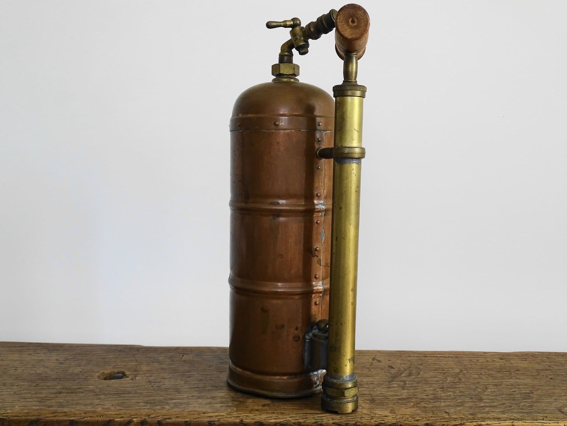 French antique copper plant sprayer or Pulvérisateur. Copper garden sprayer for industrial decorative accent.