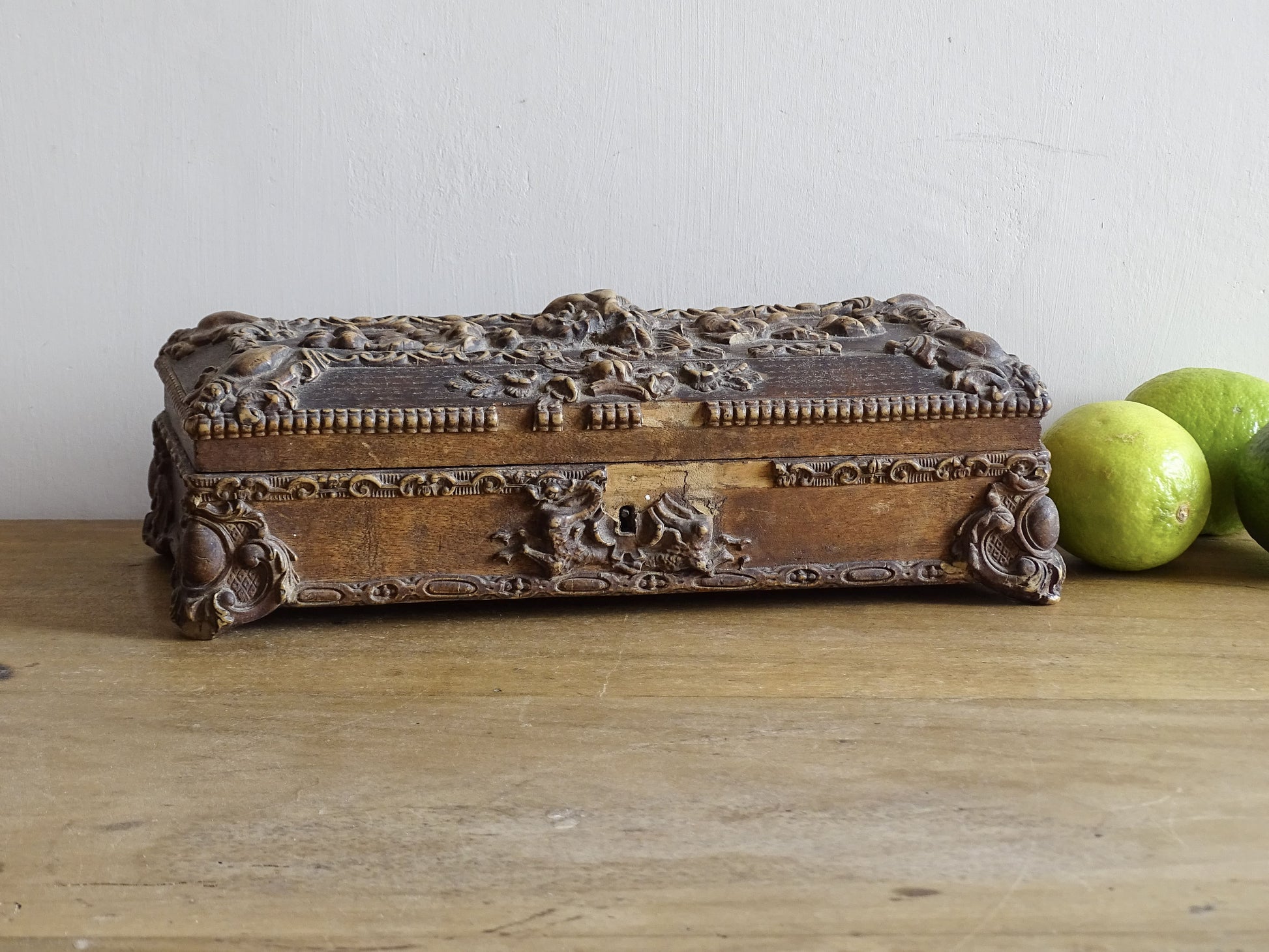 French antique glove box. Wooden box with intricate carvings timeworn patina for antique bedroom decor