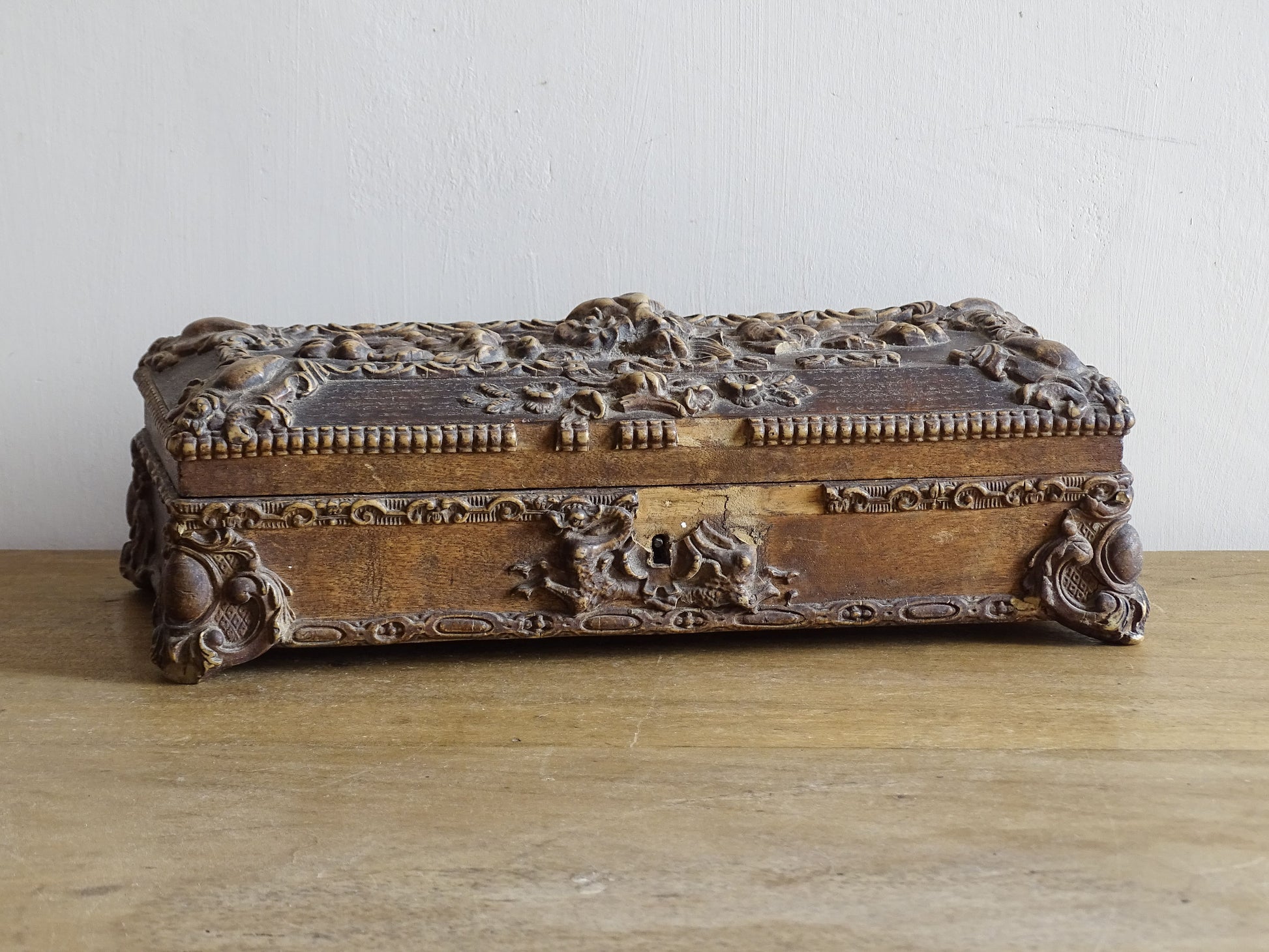 French antique glove box. Wooden box with intricate carvings timeworn patina for antique bedroom decor