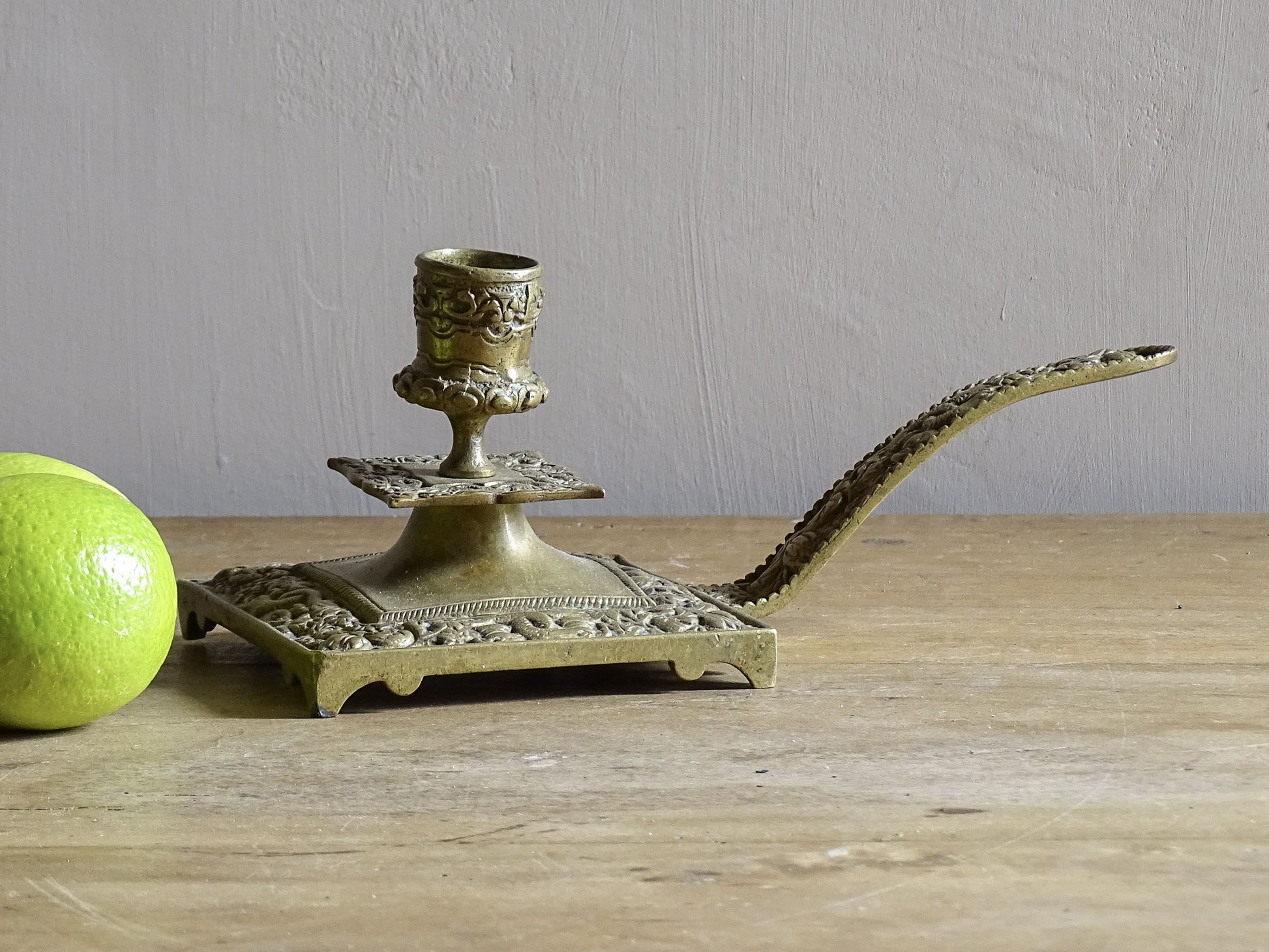 French antique brass candle holder or chamberstick with handle.