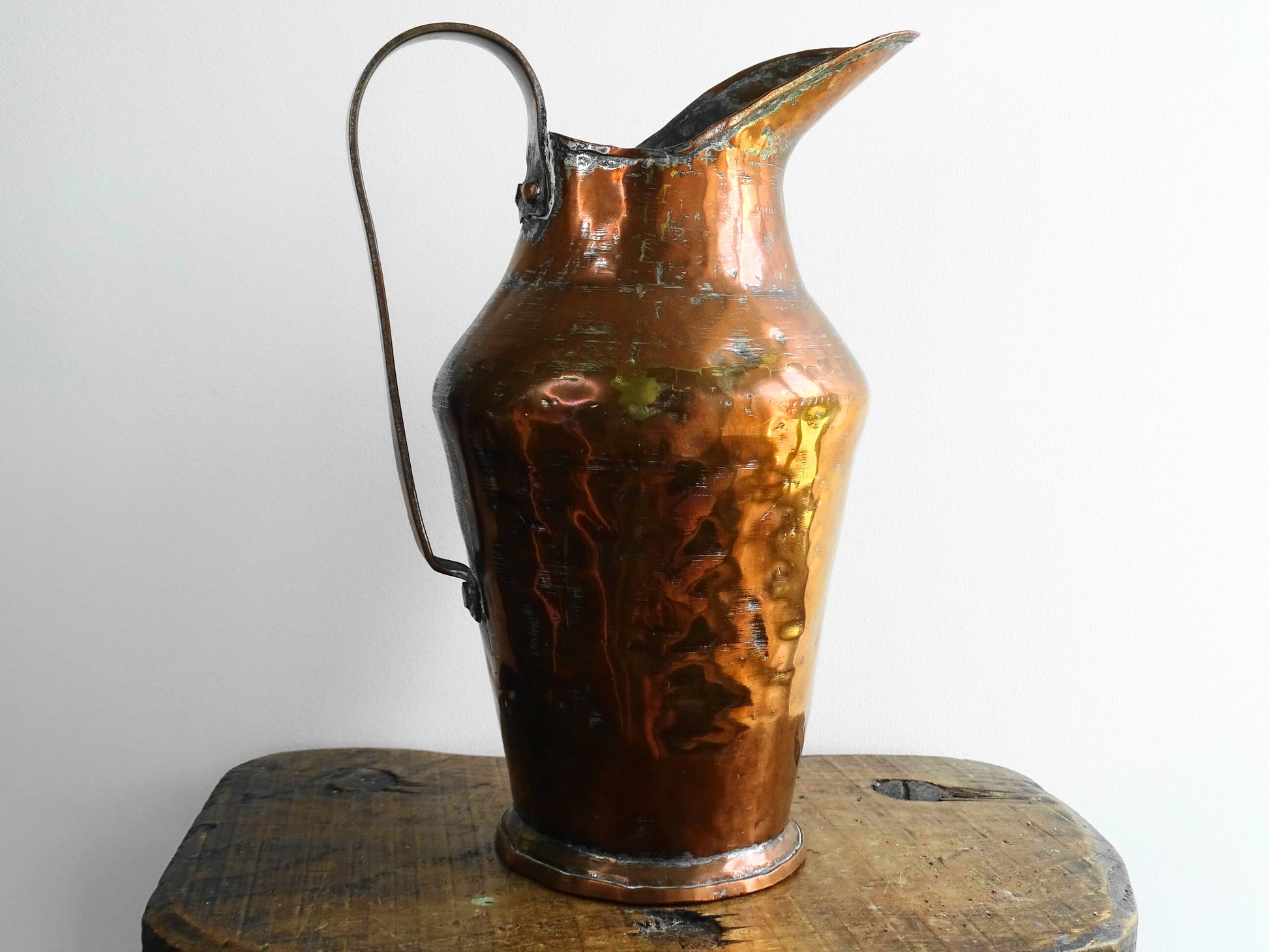 French antique copper pitcher with handle and dovetail seam. Tall copper jug for French countryside decor.