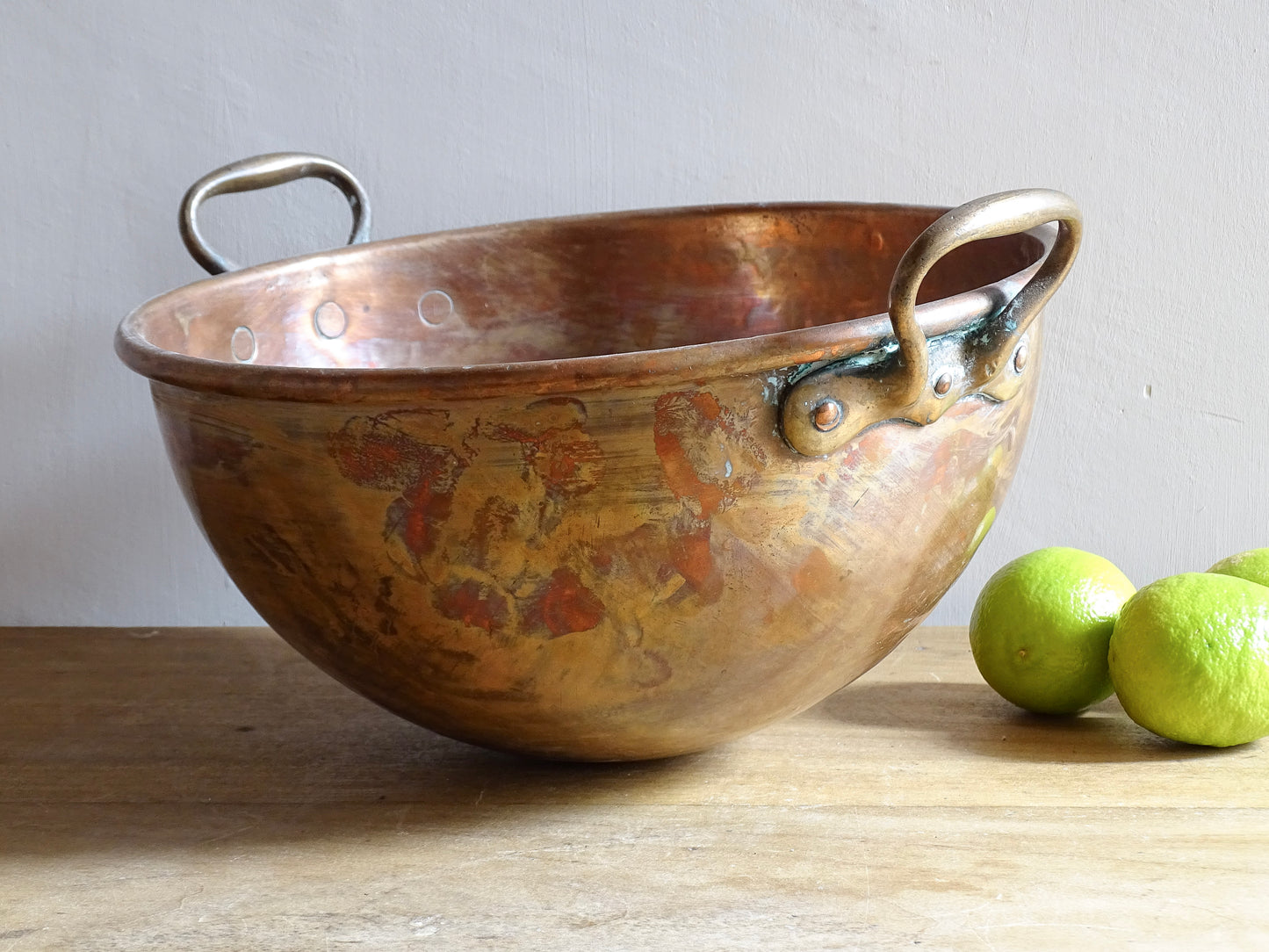 French antique copper bowl for confectioners with brass handles. Cul de poule with curved base (meringue bowl). French country farmhouse aesthetic.