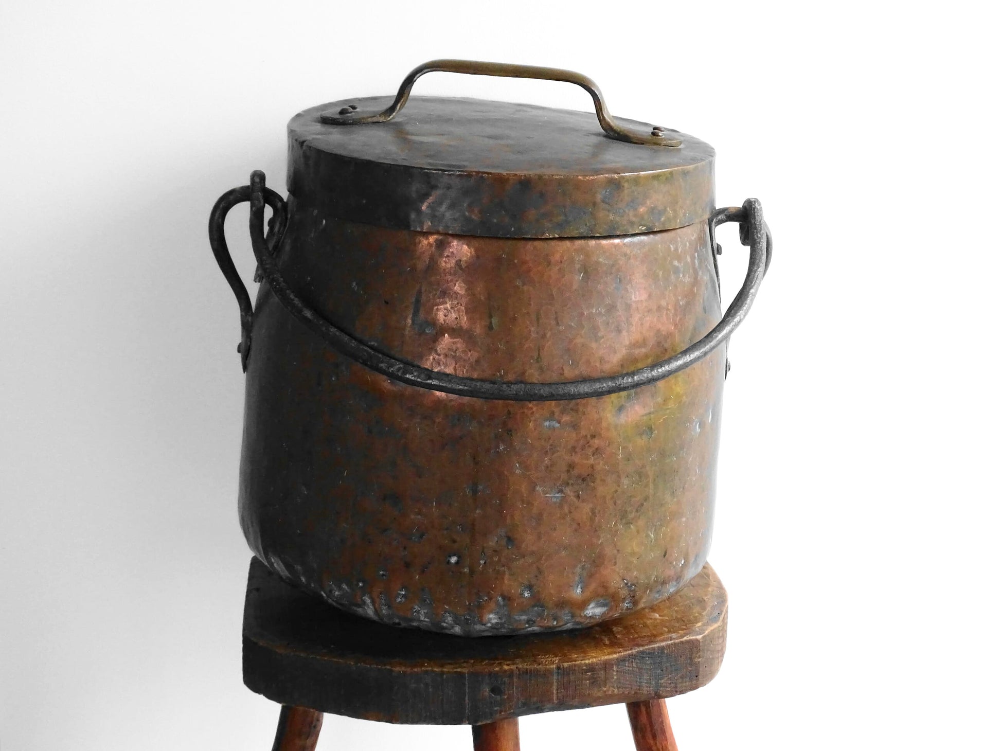 Large antique French copper cauldron with wrought iron handle, lid and rounded base. French farmhouse kitchen decor. 