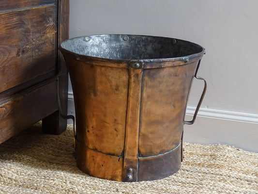Large antique French copper pail with aged finish, originally used as a water vessel, known as a ferrat.