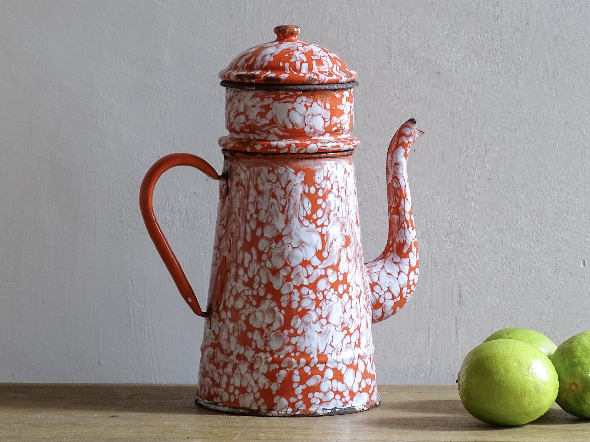 french vintage enamelware coffee pot in red and white marble effect