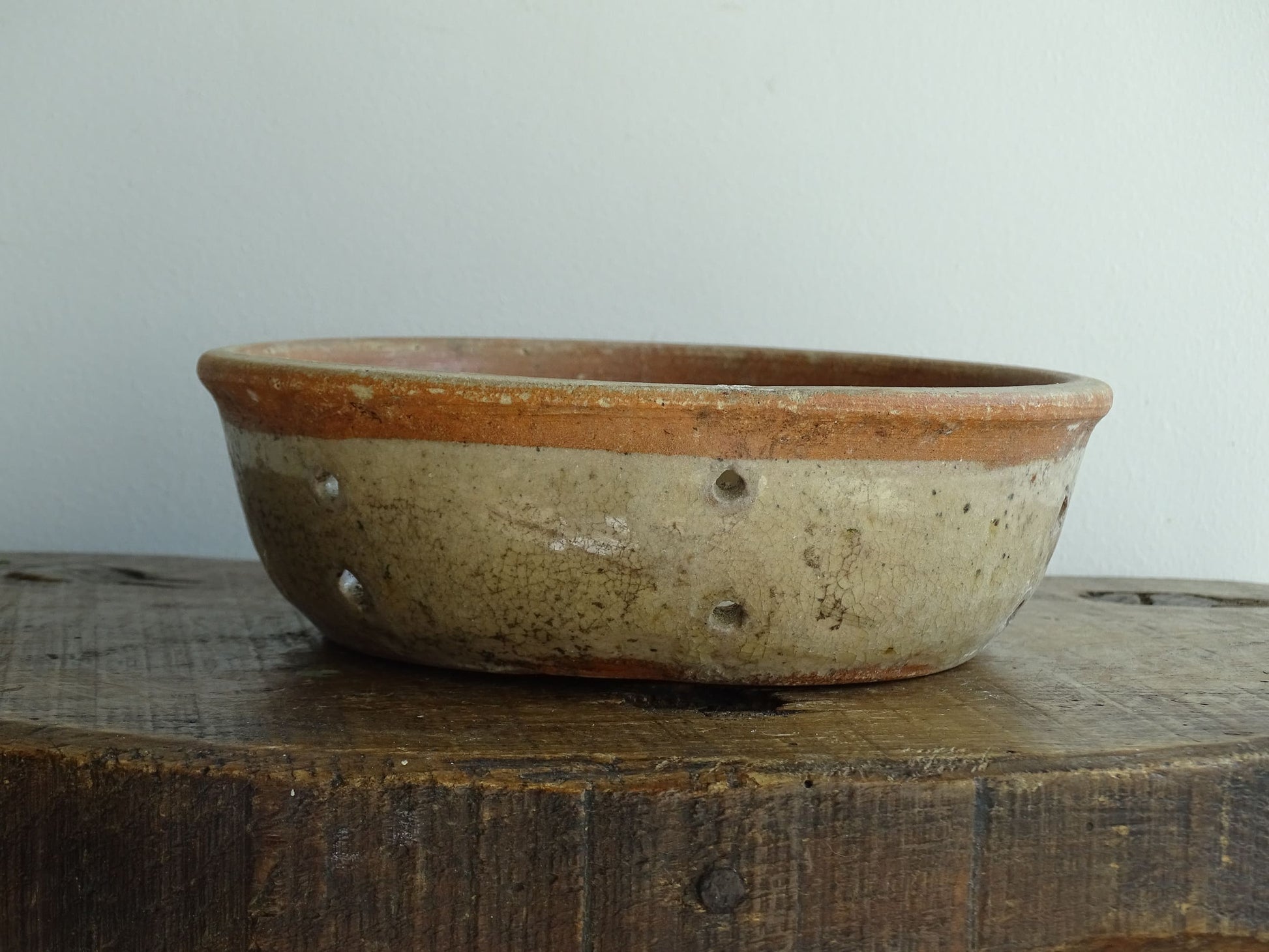 French antique terracotta faisselle cheese strainer. Rustic French pottery sieve for a French farmhouse kitchen.