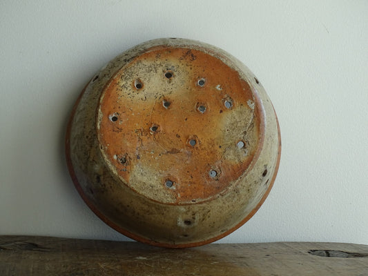 French antique terracotta faisselle cheese strainer. Rustic French pottery sieve for a French farmhouse kitchen.