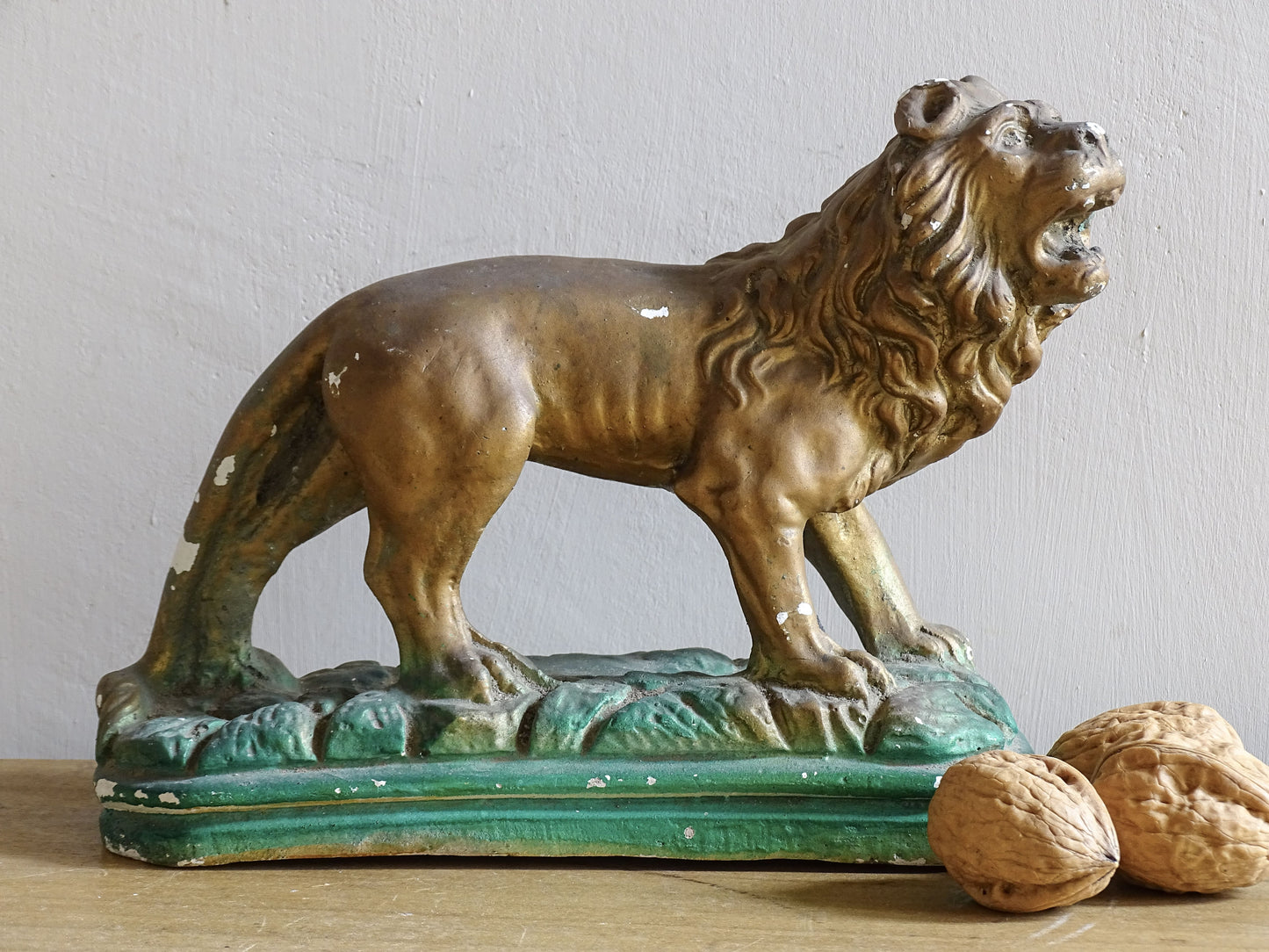 French vintage plaster lion statue painted in gold and green