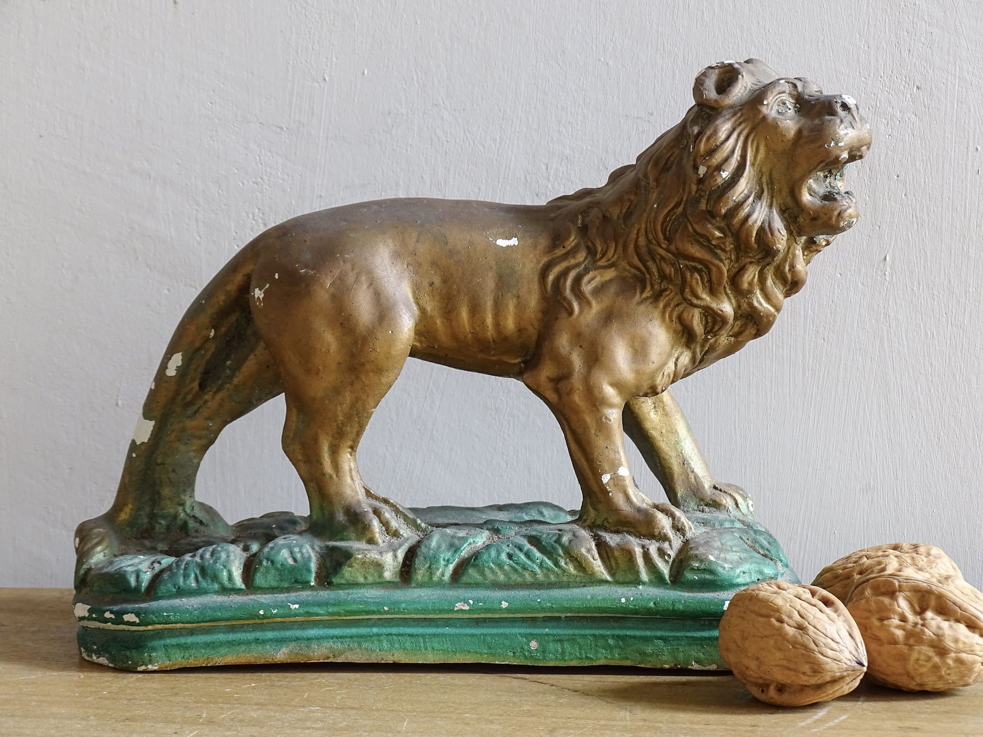French vintage plaster lion statue painted in gold and green