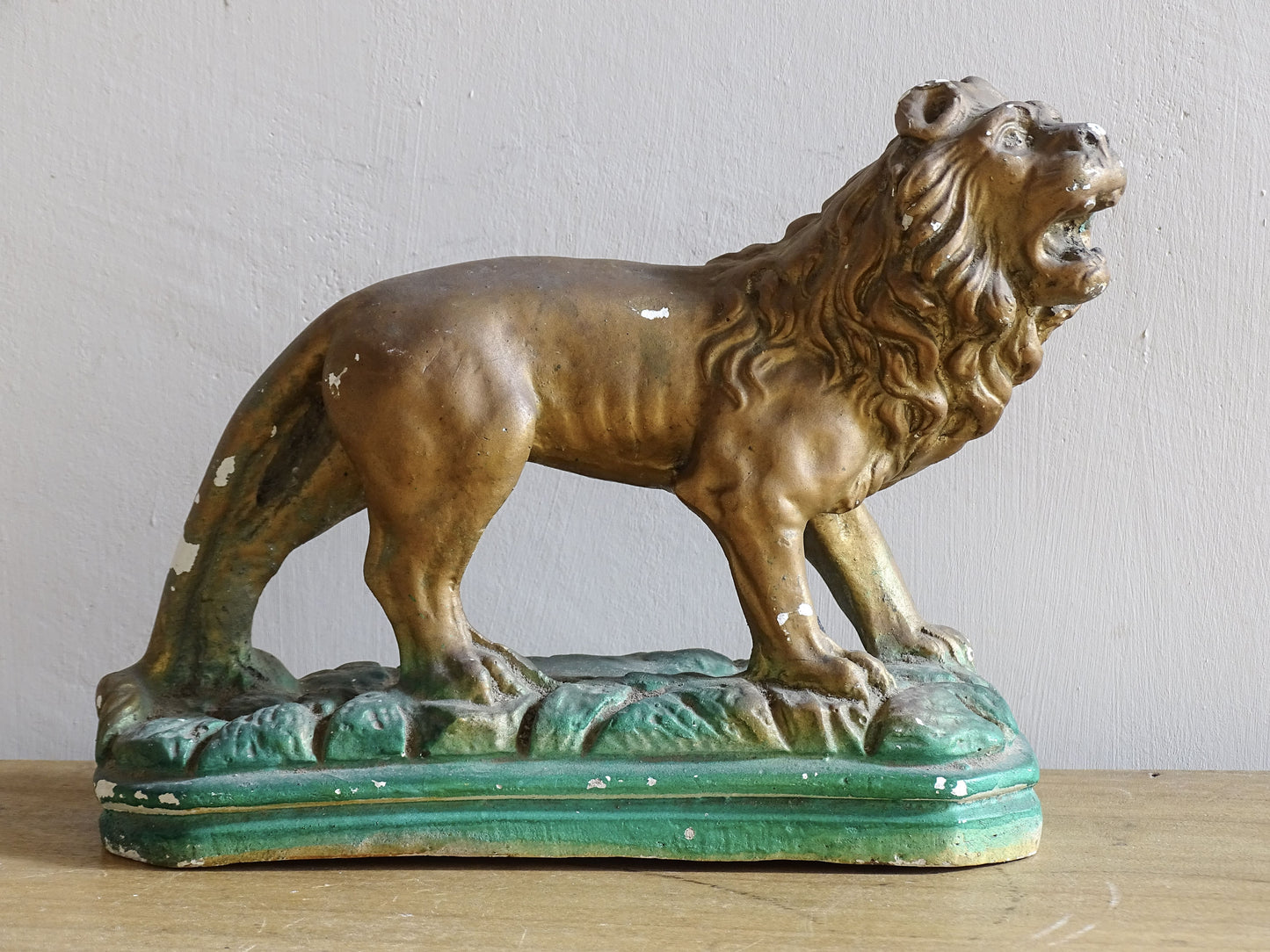 French vintage plaster lion statue painted in gold and green