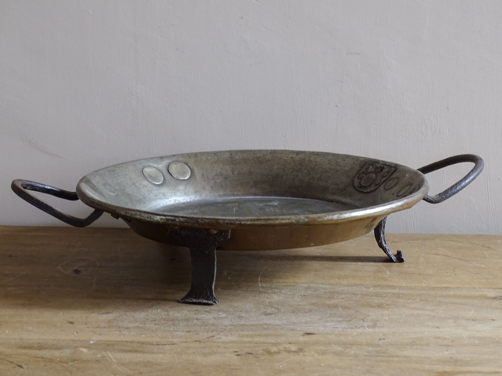 French antique copper pan with cast iron handles and feet