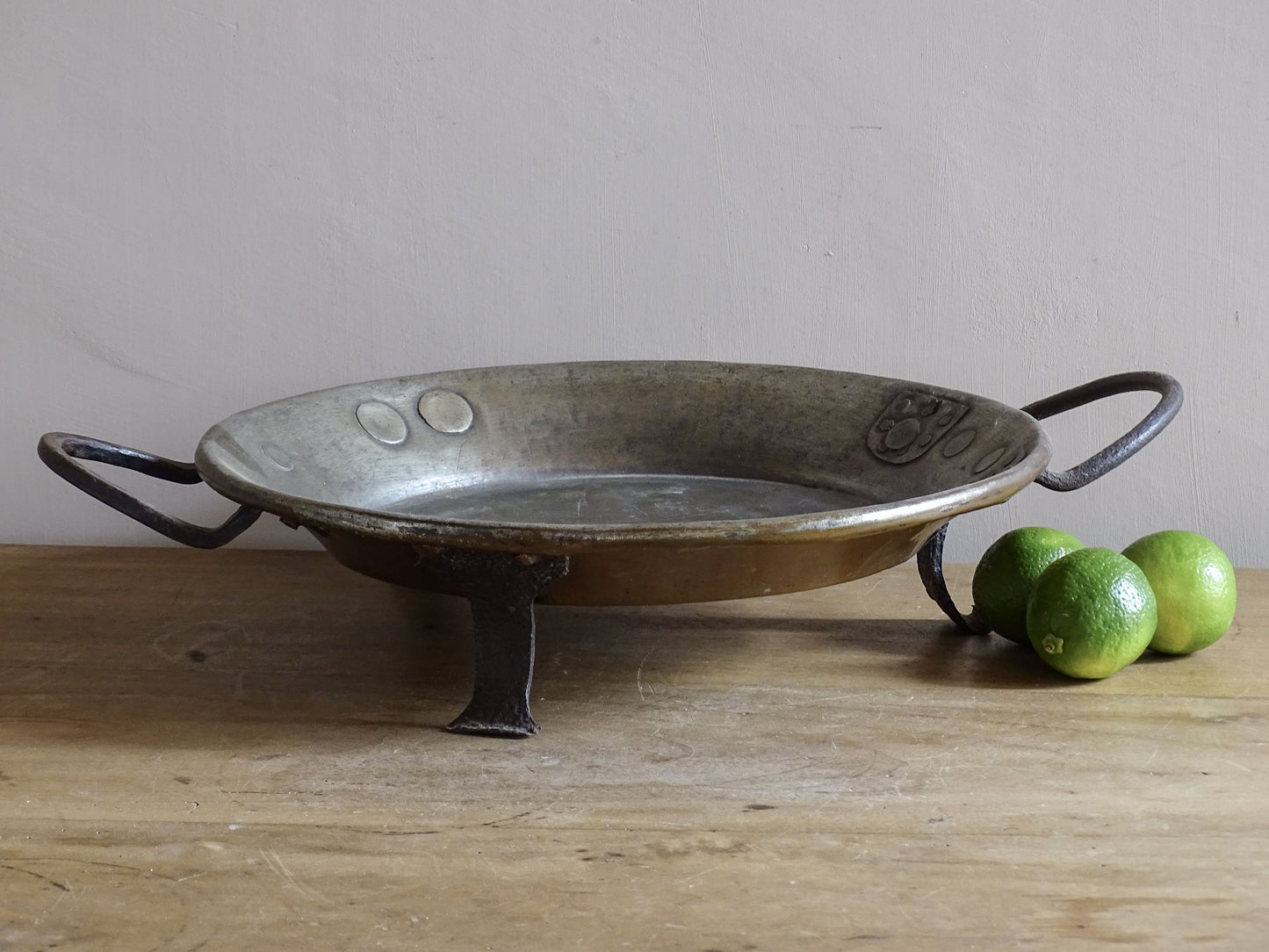 French antique copper pan with cast iron handles and feet