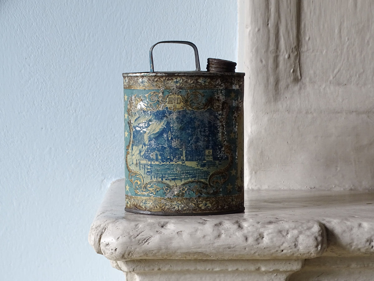 French antique holy water in from Lourdes in blue, pictured on a country house fireplace