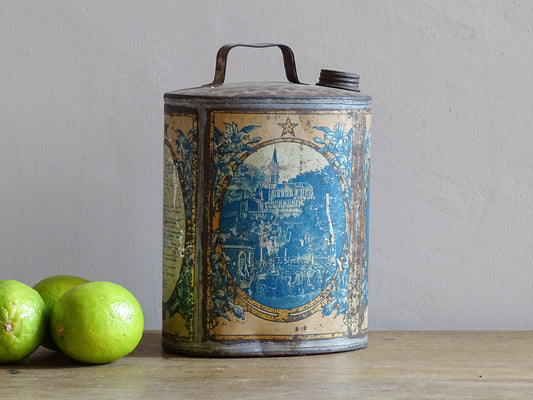 French antique Lourdes souvenir water flask. Pewter tin where the top is decorated with fleur de lis, one side depicts the cathedral (Sanctuaire de Notre-Dame de Lourdes), the other shows a crowd of people. To the side is the Virgin Mary, above her it says “Je suis l'Immaculée Conception”. The antique flask for religious decor.