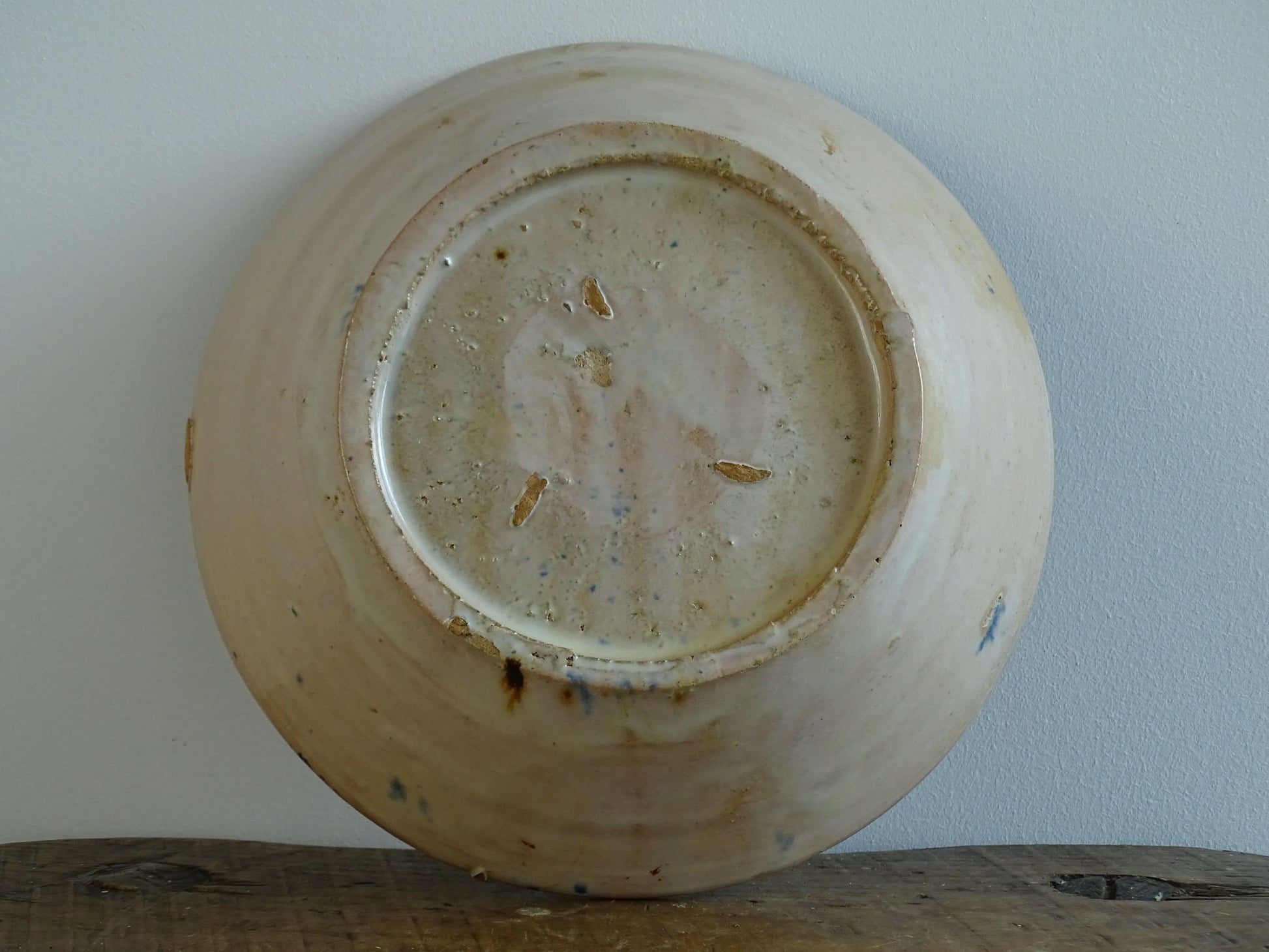 Spanish antique Fajalauza pottery lebrillo from Granada. Tin glazed terracotta bowl, hand-painted with blue leaves and flowers.