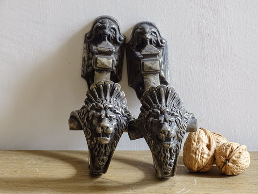 French antique curtain tie backs with lion heads. Decorative curtain hooks. 