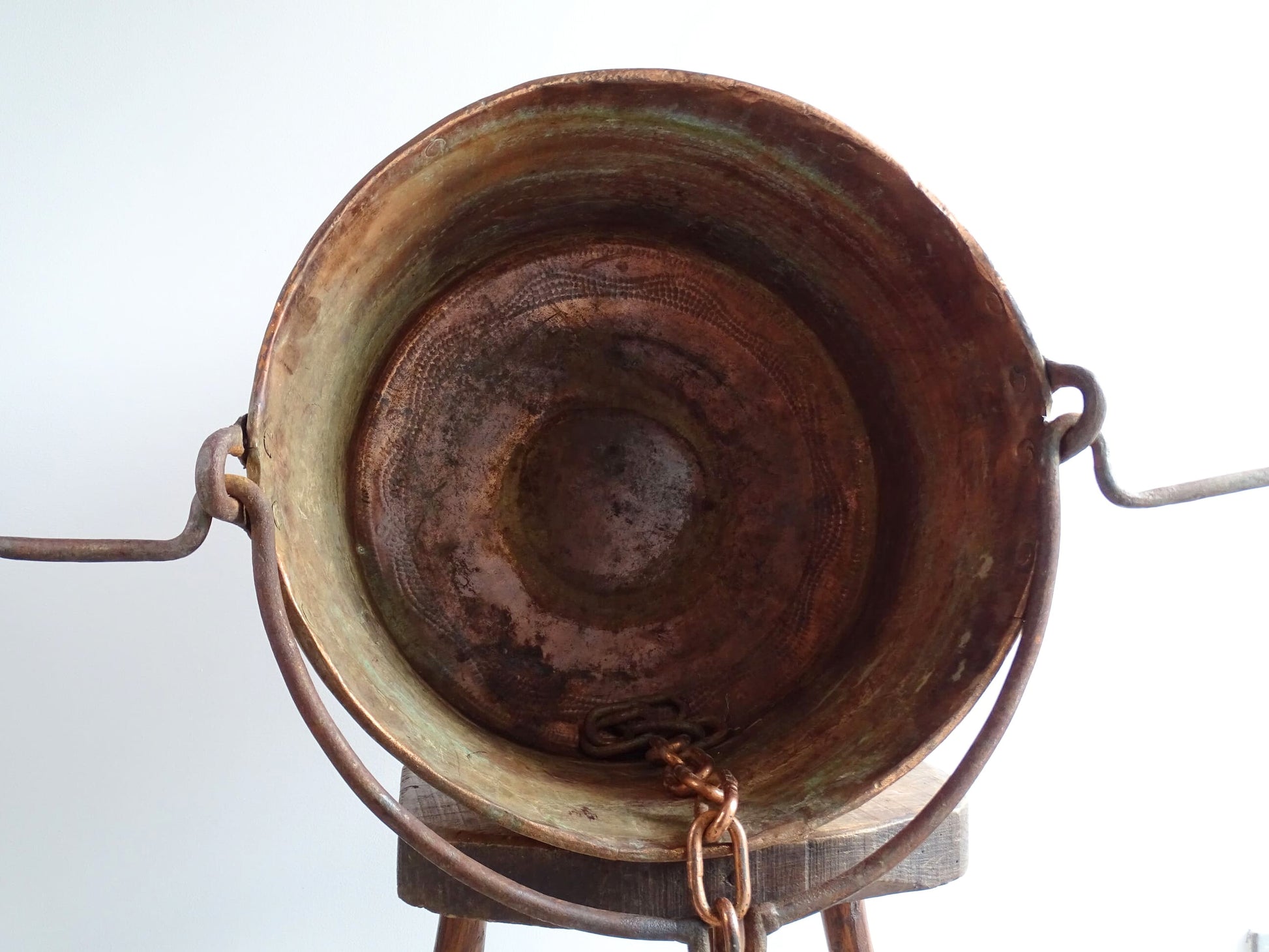 Huge French antique copper cauldron with wrought iron handle and chain, winemaker's cauldron with hammered copper body. 