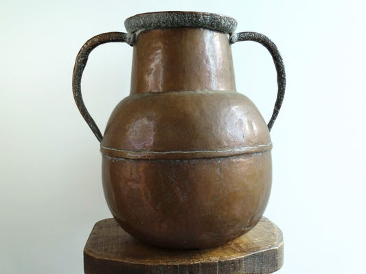 A large 18th-century antique copper water pot from Normandy with a rounded form and double handles, showcasing a warm aged patina.