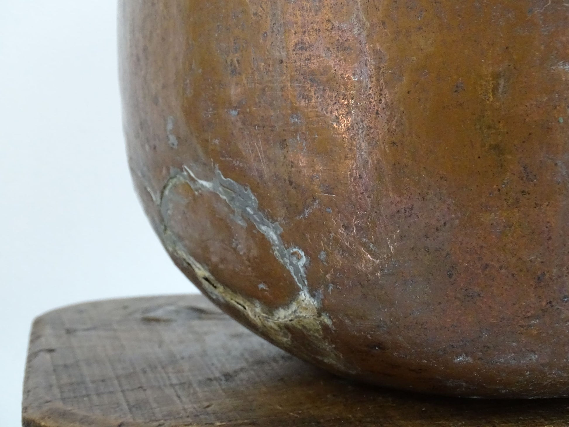 A large 18th-century antique copper water pot from Normandy with a rounded form and double handles, showcasing a warm aged patina