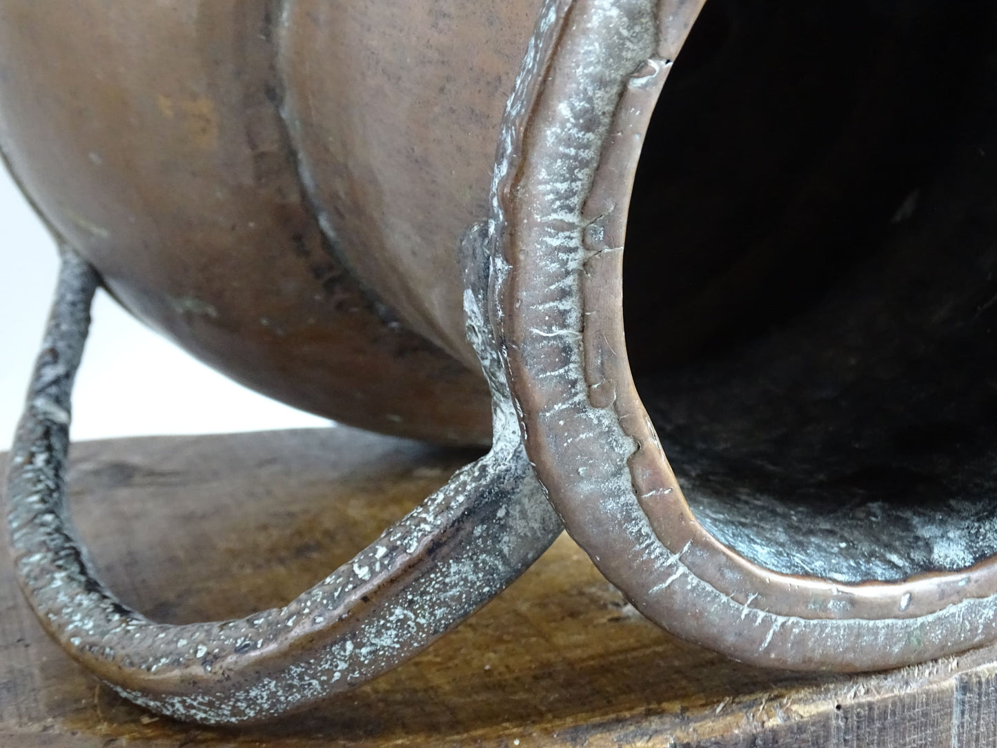 A large 18th-century antique copper water pot from Normandy with a rounded form and double handles, showcasing a warm aged patina