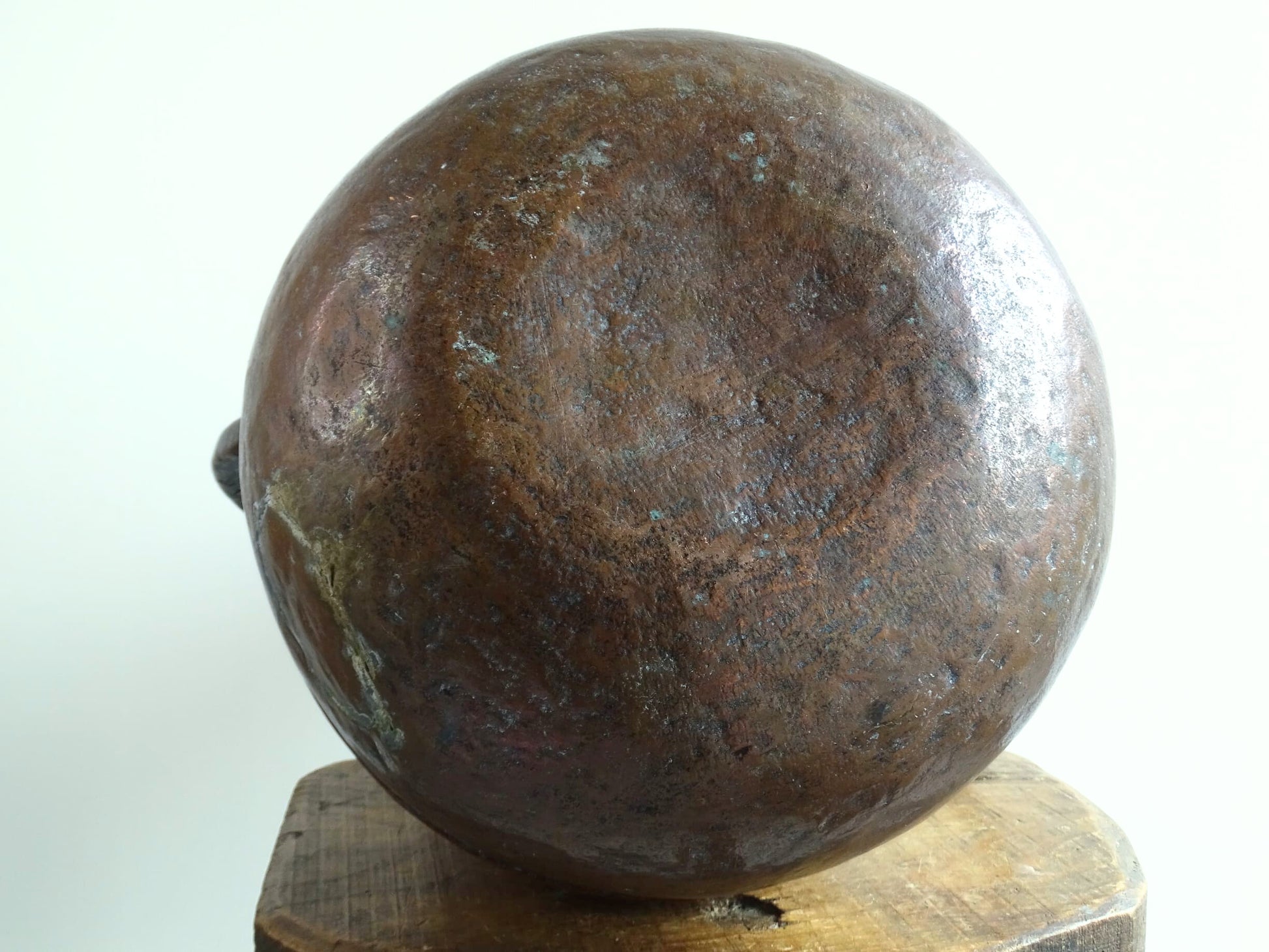 A large 18th-century antique copper water pot from Normandy with a rounded form and double handles, showcasing a warm aged patina