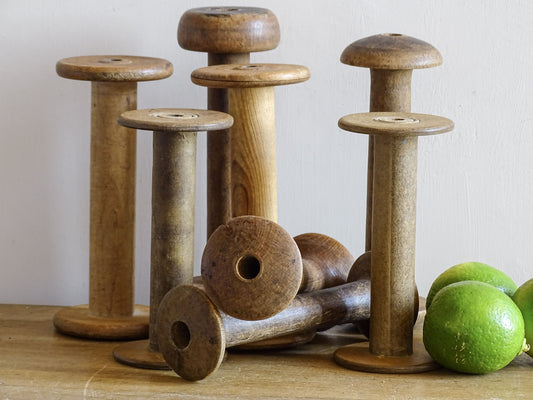 Collection of French antique wooden bobbins