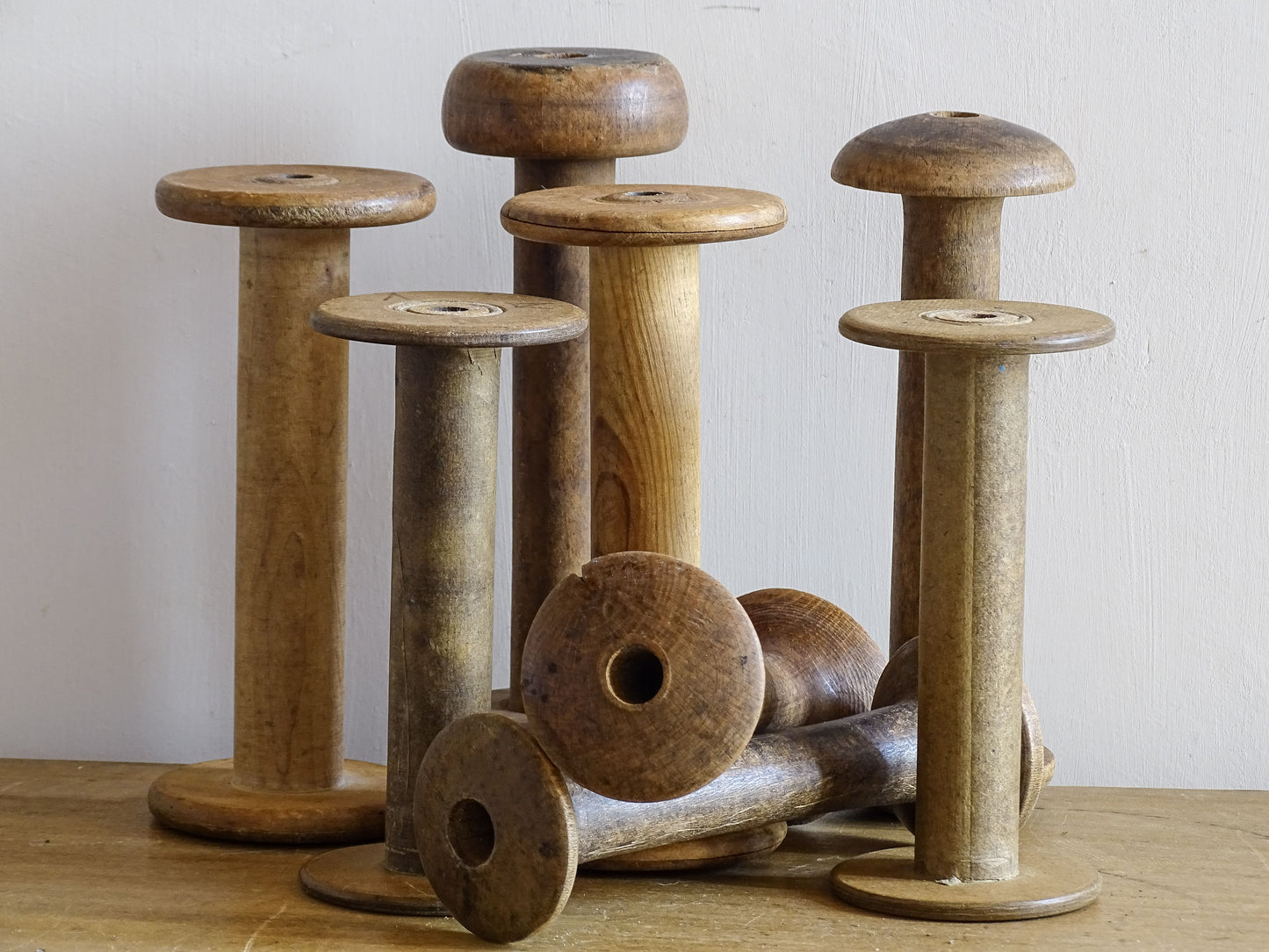 Collection of French antique wooden spools