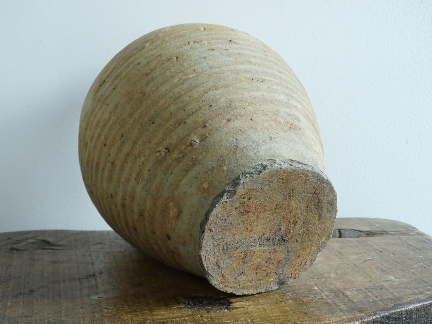 Rustic French antique pottery pitcher with orange and natural tones. Antique pitcher with rich texture for a rustic farmhouse kitchen. 