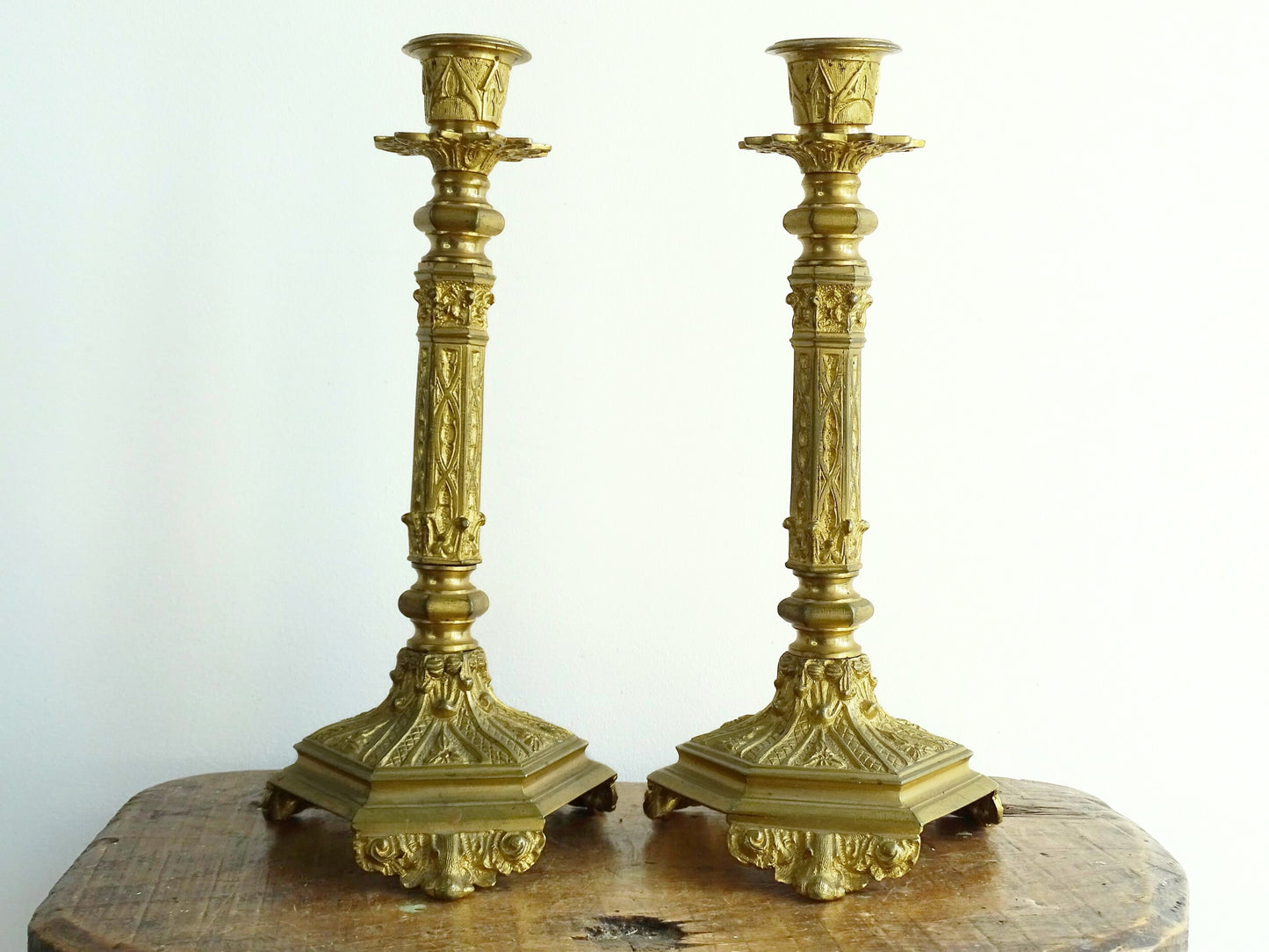 Antique French Ormolu Candlesticks from the 19th century, these antique candlesticks add a touch of French decor to your home. 