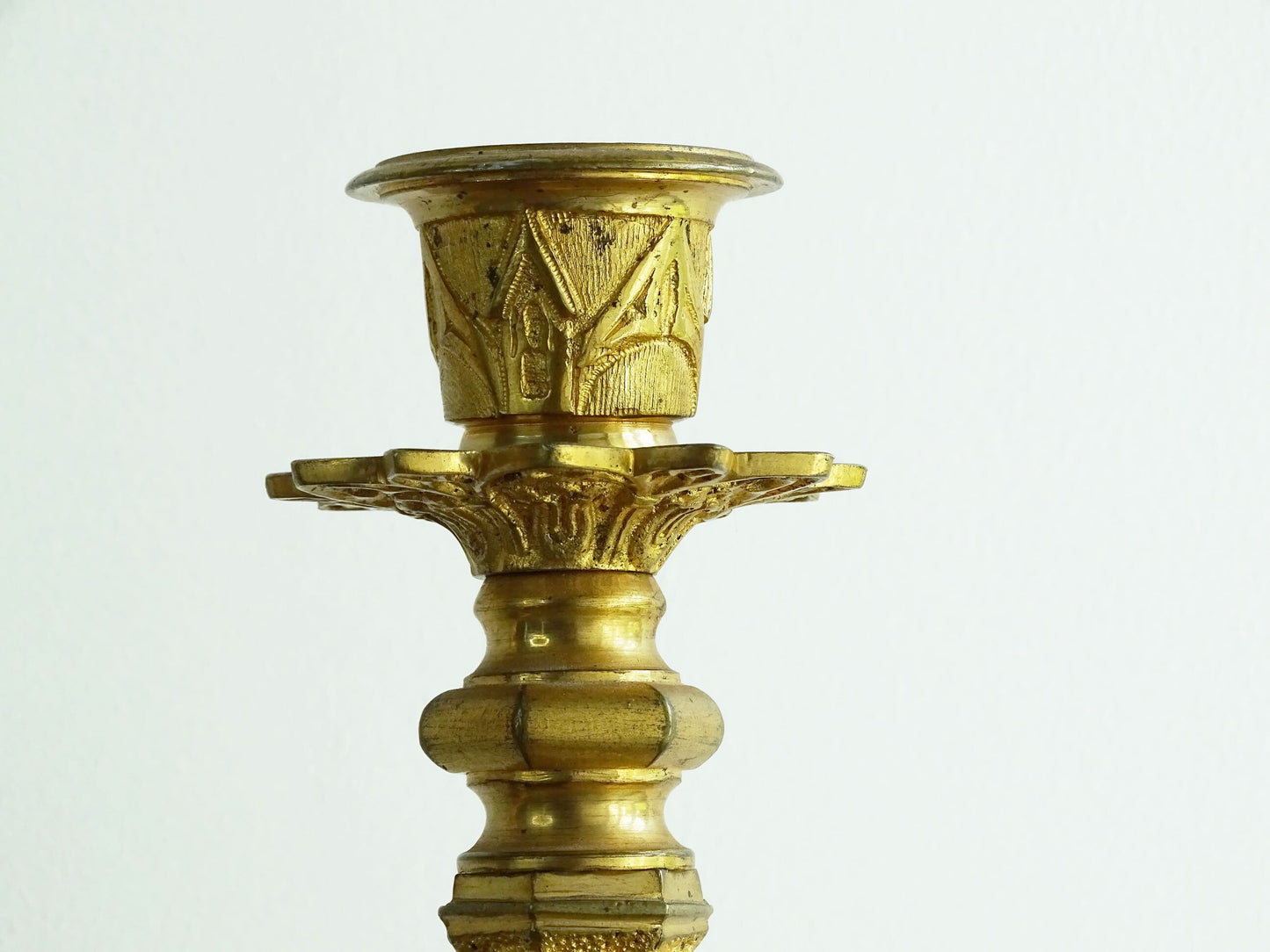 Antique French Ormolu Candlesticks from the 19th century, these antique candlesticks add a touch of French decor to your home. 