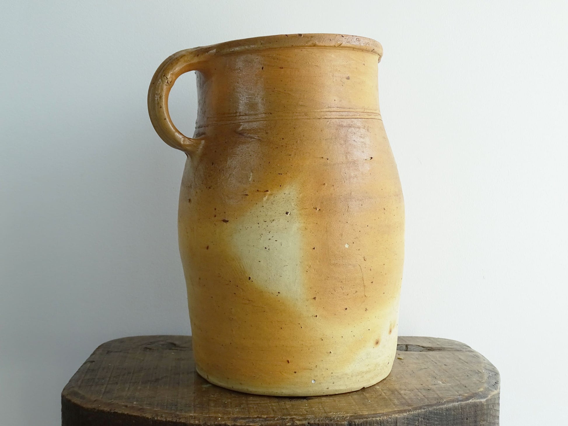 French antique pottery milk jug with orange tones for rustic farmhouse decor.