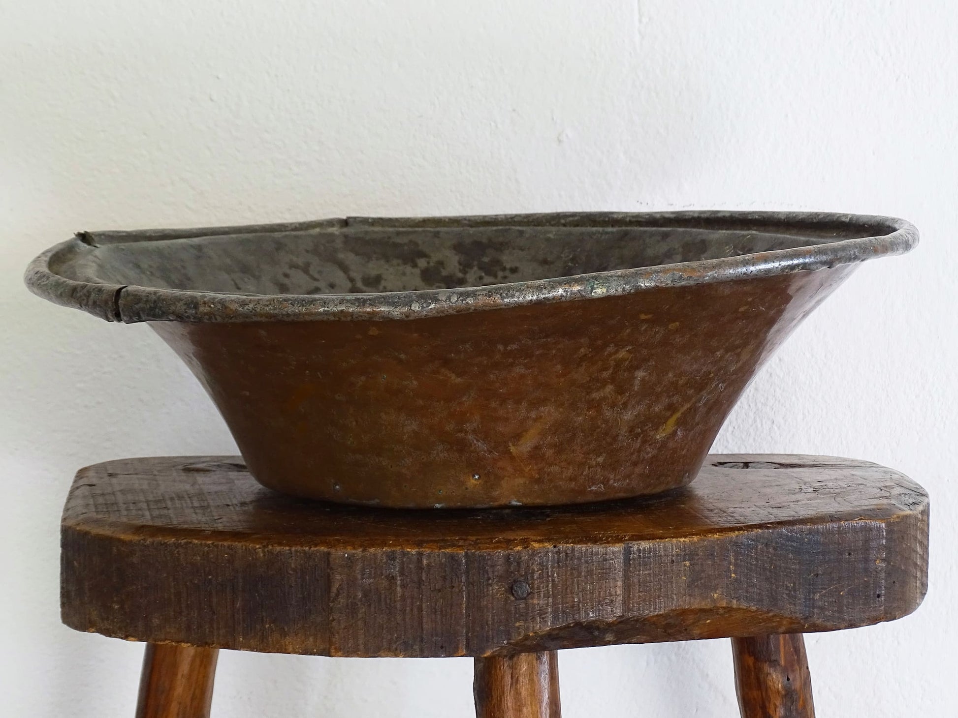 French antique tinned copper bowl with timeworn patina. Antique bowl that would make a rustic table centrepiece in French country farmhouse aesthetic.