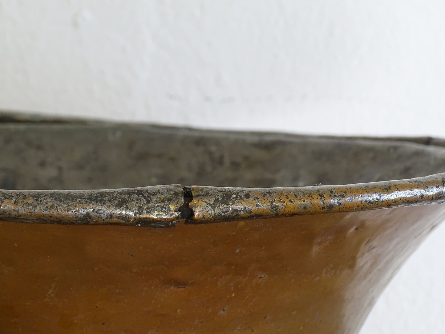 French antique tinned copper bowl with timeworn patina. Antique bowl that would make a rustic table centrepiece in French country farmhouse aesthetic.