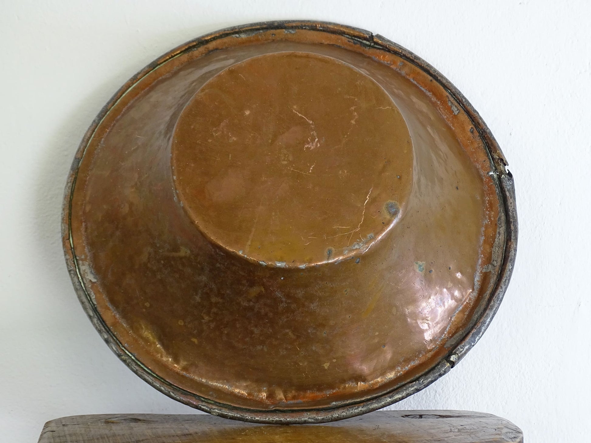 French antique tinned copper bowl with timeworn patina. Antique bowl that would make a rustic table centrepiece in French country farmhouse aesthetic.