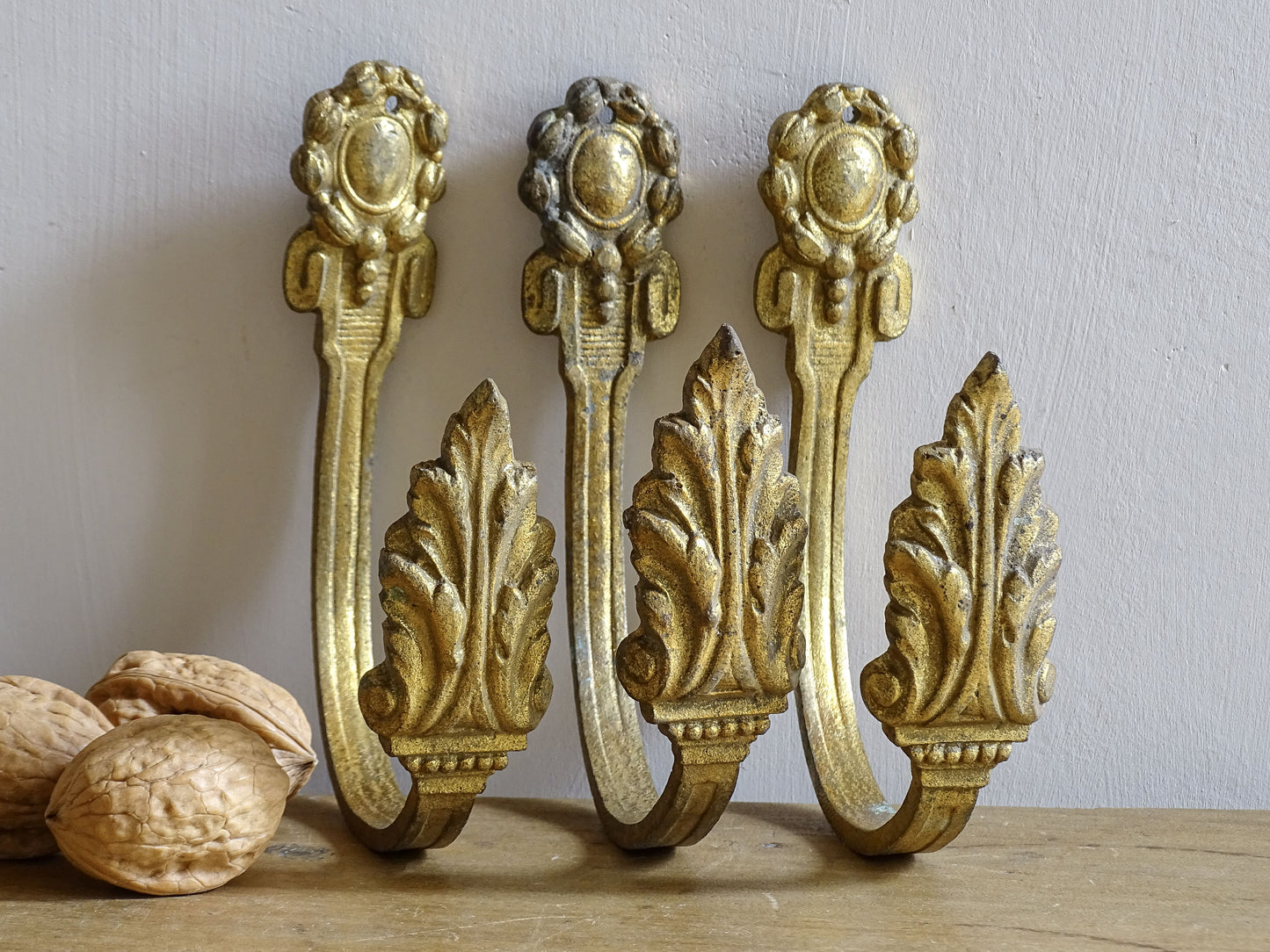 French antique gilt bronze curtain hooks with acanthus leaves