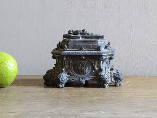 French antique pewter inkwell with religious decoration, it has a Cross and Sleeping Baby Jesus and Sacred Heart of Jesus Symbol