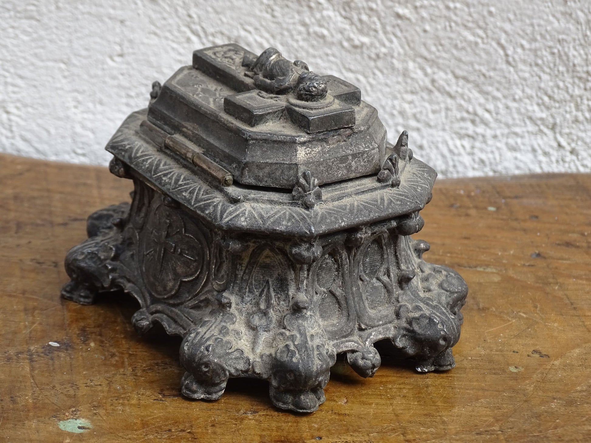 French antique pewter inkwell with religious decoration, it has a Cross and Sleeping Baby Jesus and Sacred Heart of Jesus Symbol