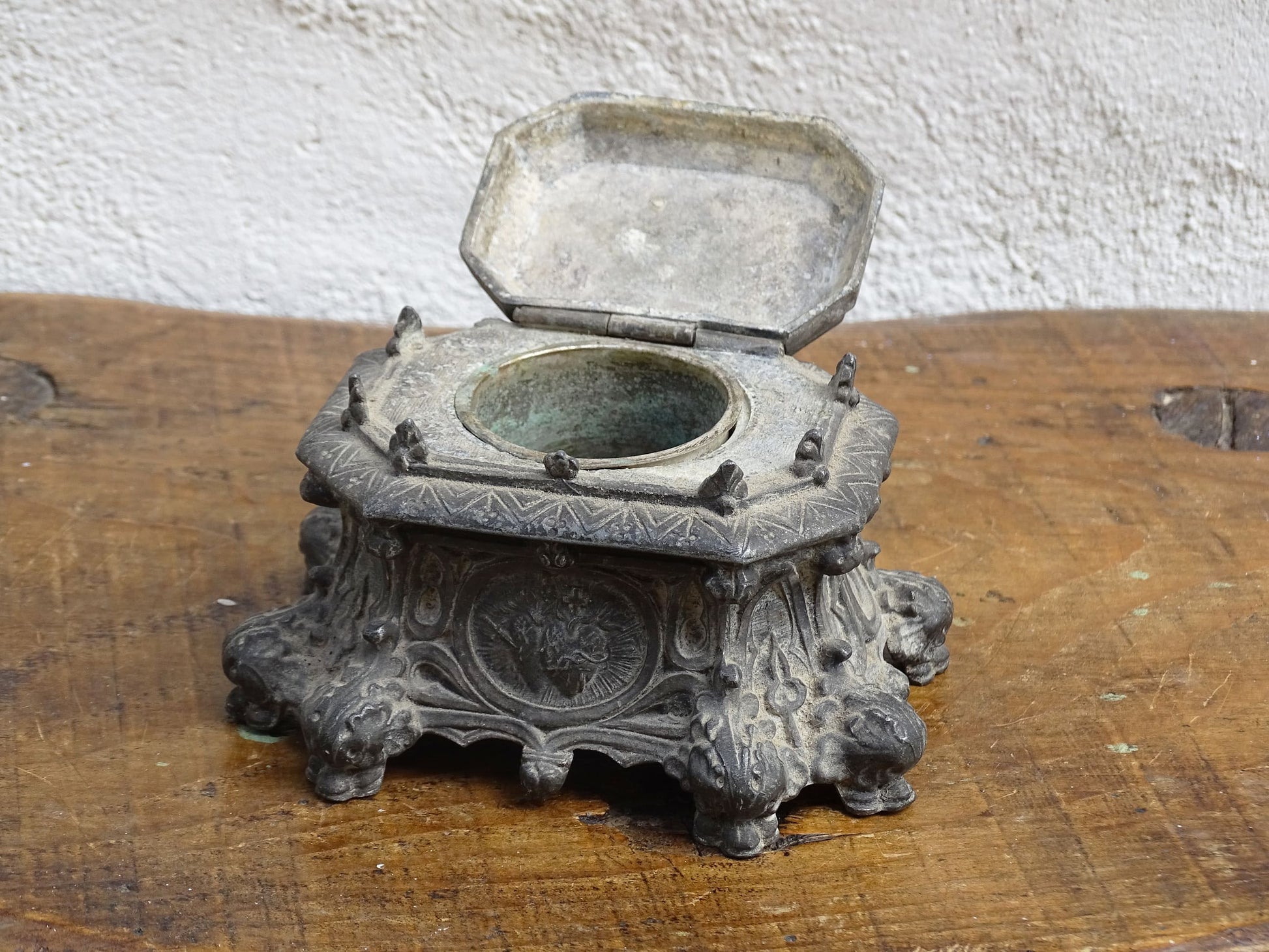 French antique pewter inkwell with religious decoration, it has a Cross and Sleeping Baby Jesus and Sacred Heart of Jesus Symbol