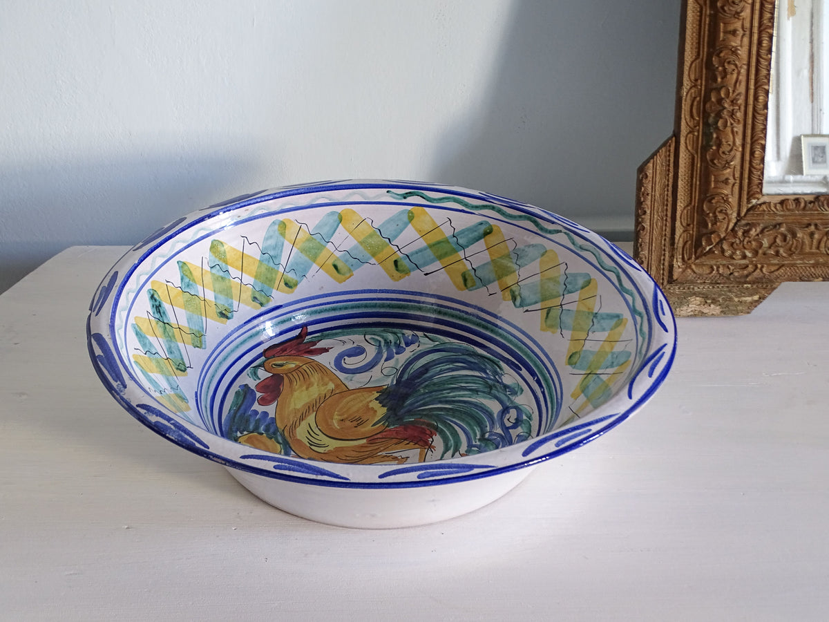 Spanish vintage ceramic lebrillo from Triana with cockerel and geometric pattern 