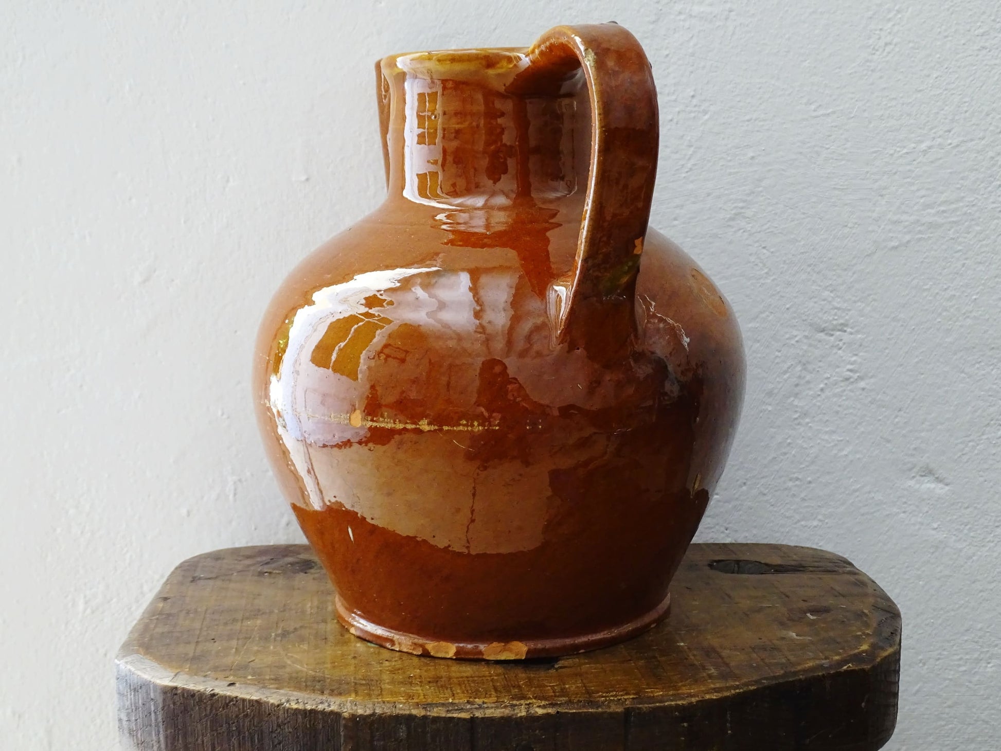 French antique glazed terracotta pottery orjol jug or pitcher with deep orange colour glaze