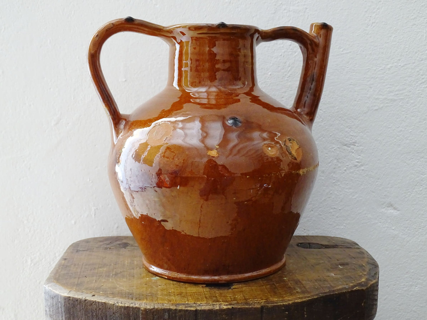 French antique glazed terracotta pottery orjol jug or pitcher with deep orange colour glaze