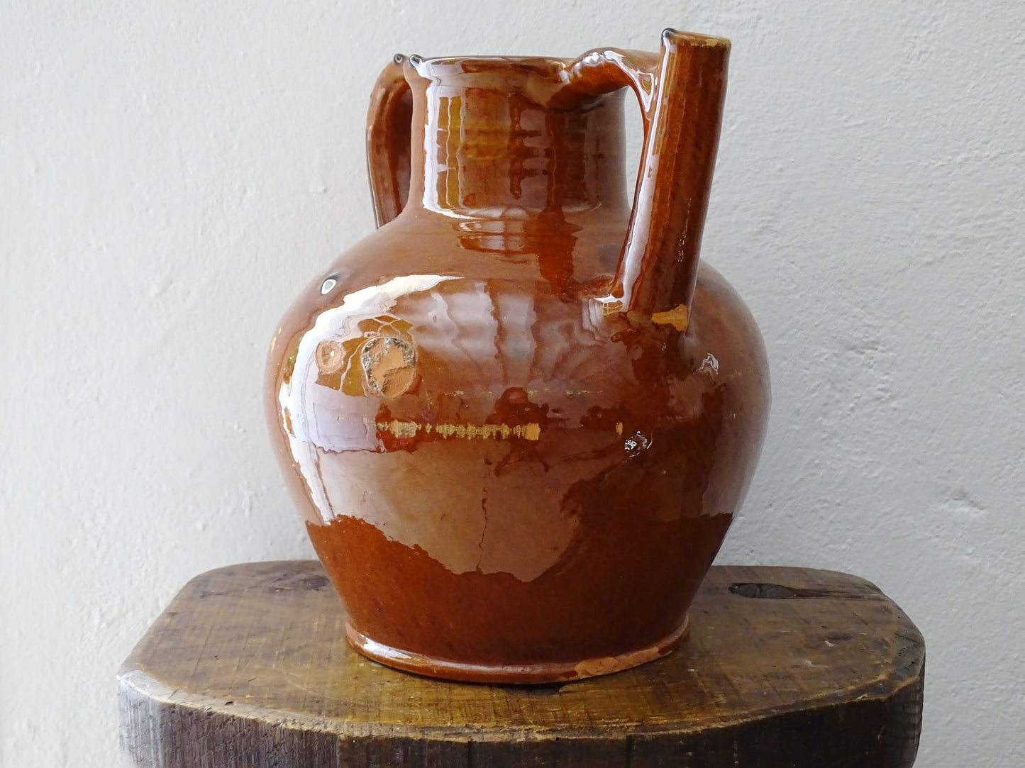 French antique glazed terracotta pottery orjol jug or pitcher with deep orange colour glaze