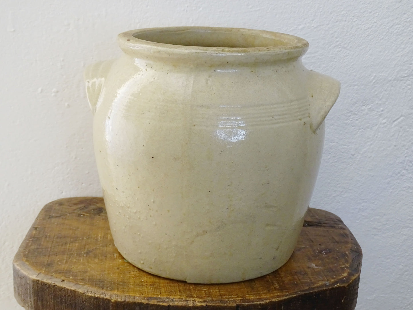 Rustic antique French stoneware confit pot. Glazed pottery cache pot in a pale oatmeal glaze. French farmhouse style home decor.