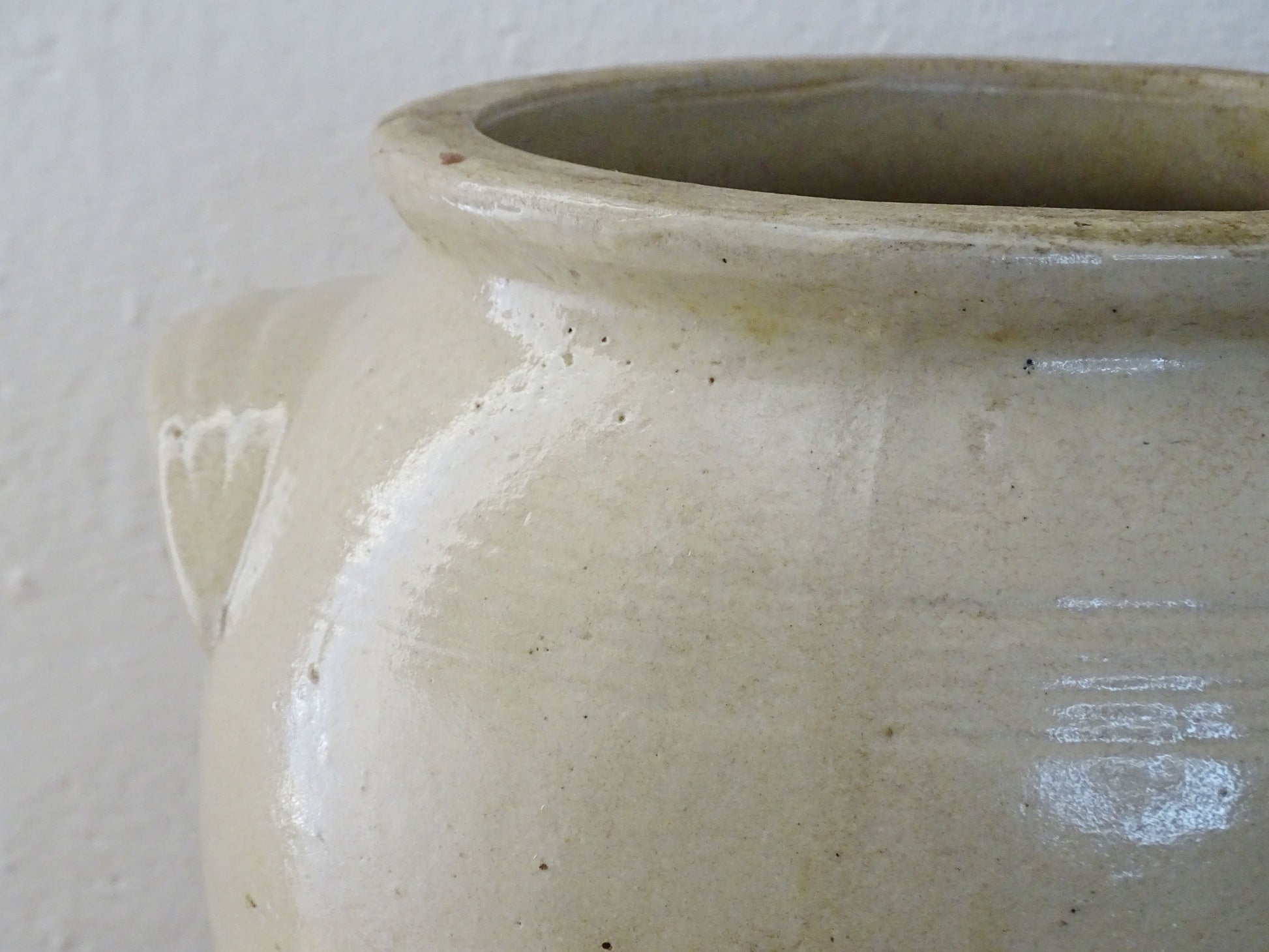 Rustic antique French stoneware confit pot. Glazed pottery cache pot in a pale oatmeal glaze. French farmhouse style home decor.