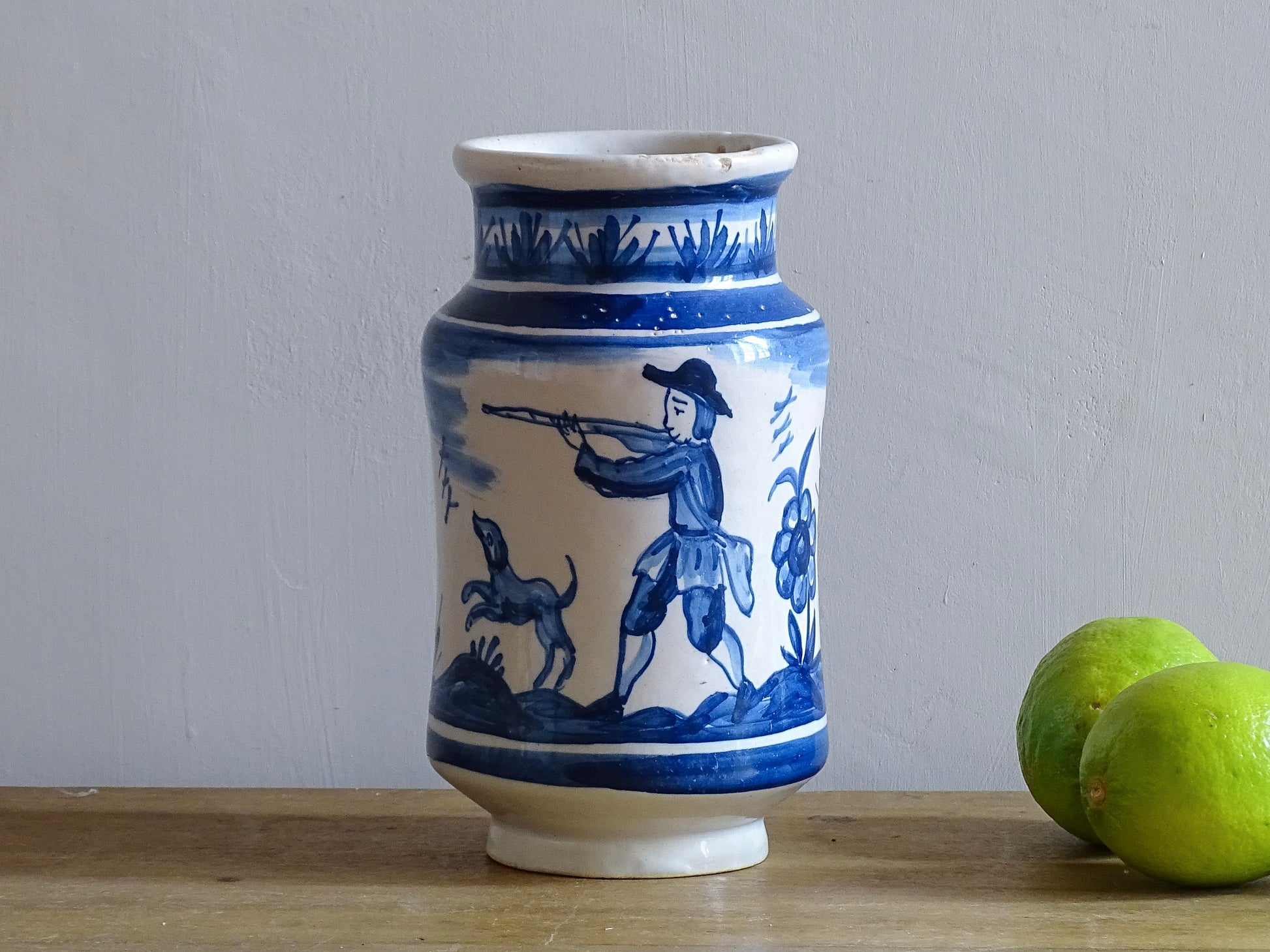 a vintage Spanish Catalan Albarello Pottery Pharmacy jar it is tin-glazed and hand-painted in blue and white