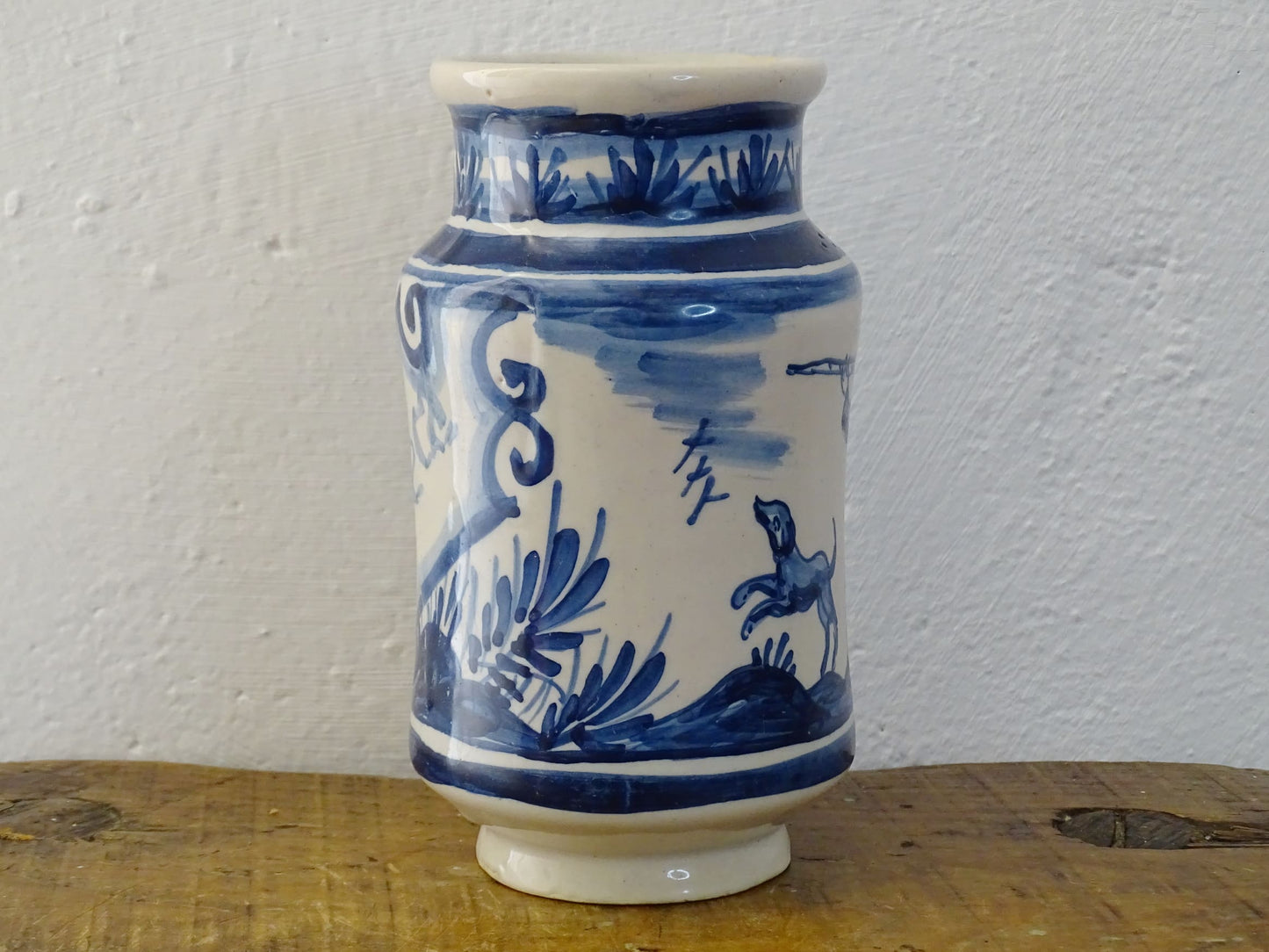 a vintage Spanish Catalan Albarello Pottery Pharmacy jar it is tin-glazed and hand-painted in blue and white